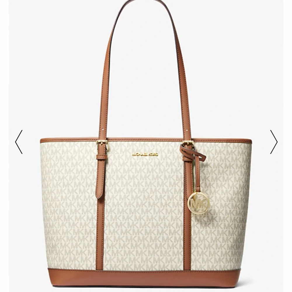 MICHAEL KORS
Jet Set Travel Large Logo Tote Shoulder Bag
COLOR VANILLA 
NWT - Picture 2 of 16